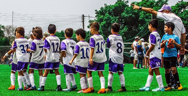 Children sports team displaying jersey numbers